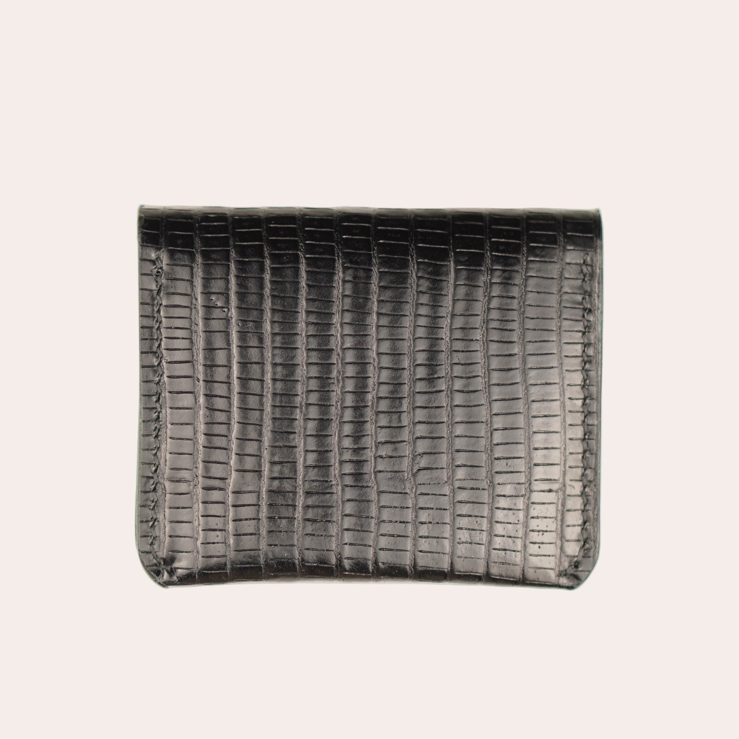 Black woven rectangular basket on a white background