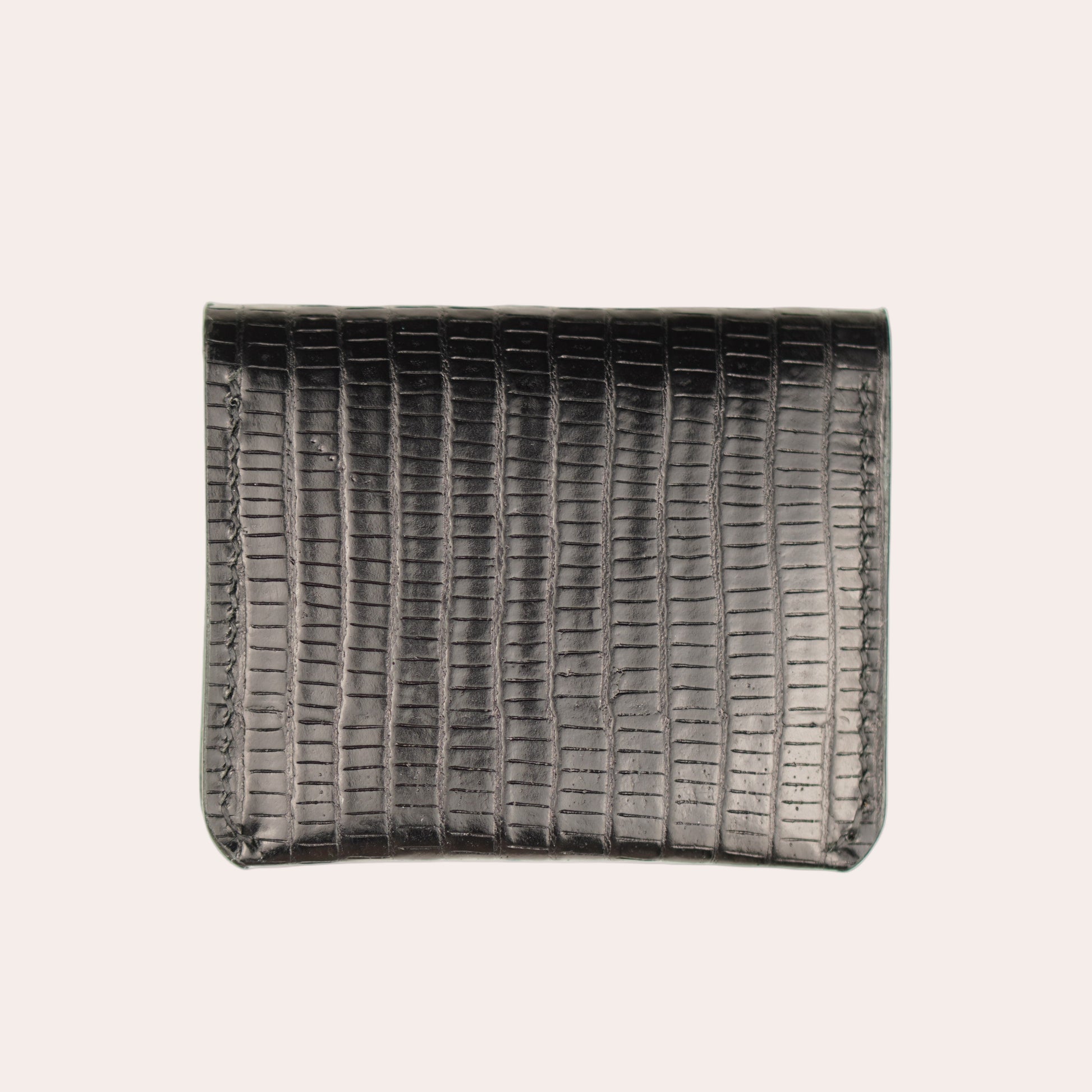 Black woven rectangular basket on a white background