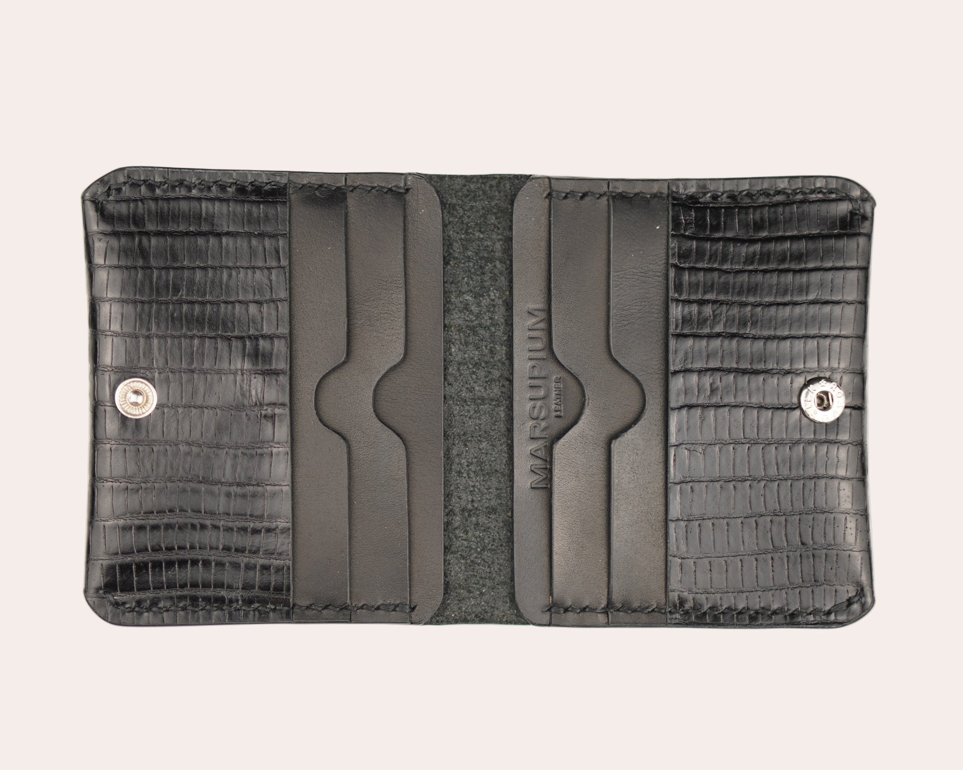 Black textured wallet with brand logo on a white background