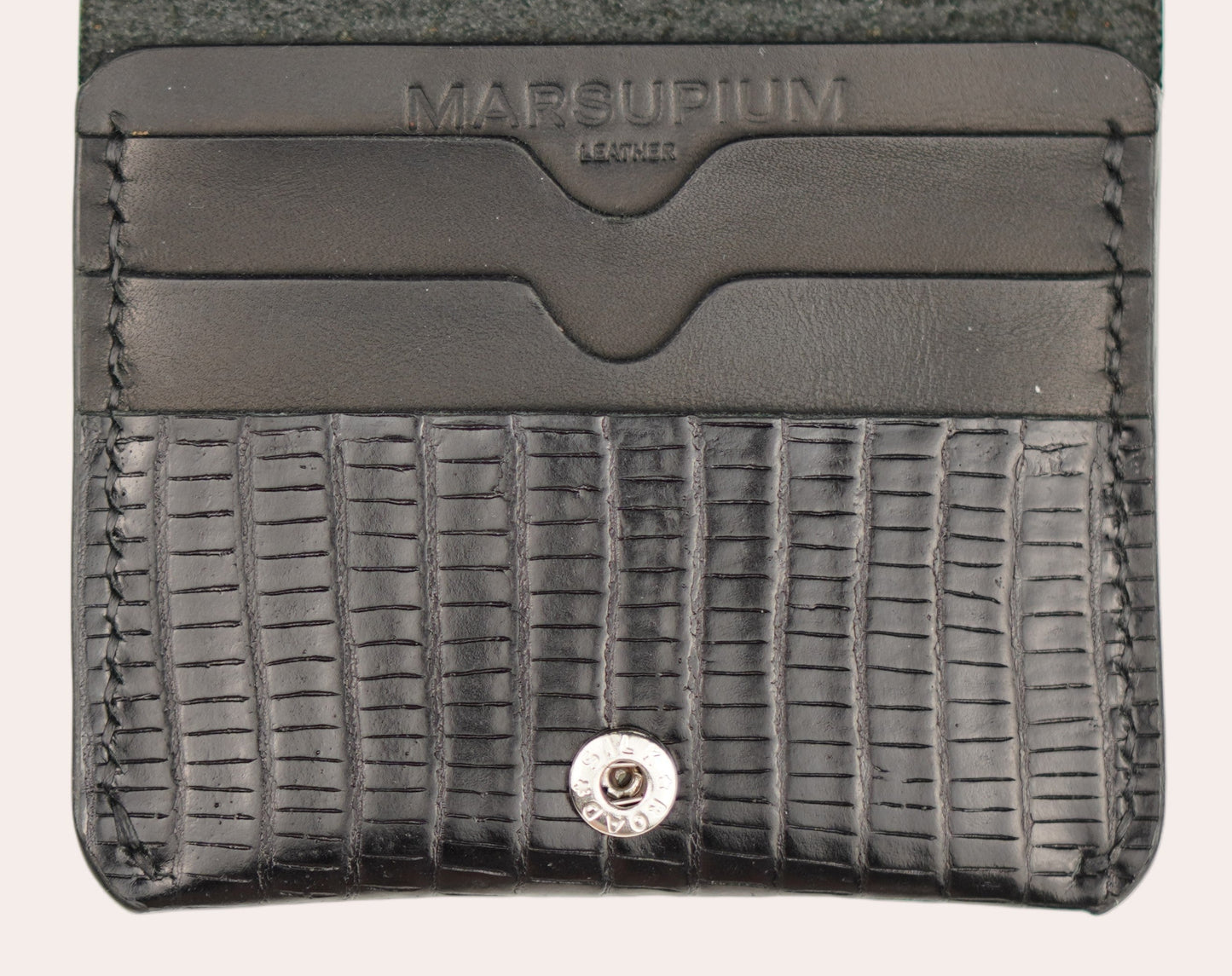 Black leather wallet with 'Yale & Towne' branding on a white background