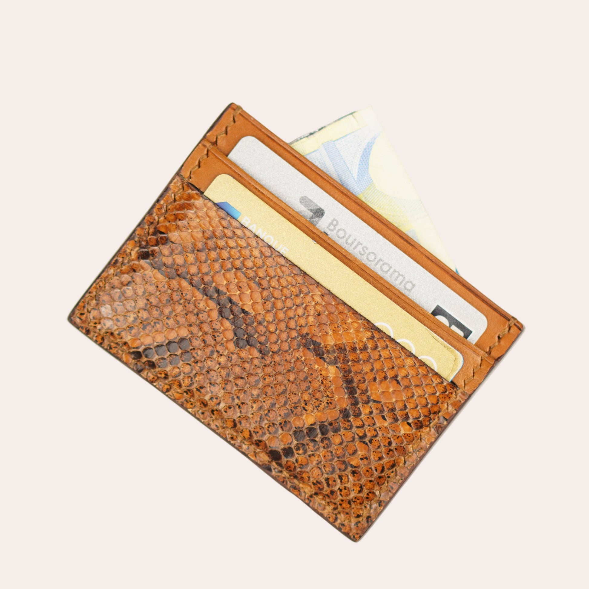 Brown textured wallet with a card holder on a white background