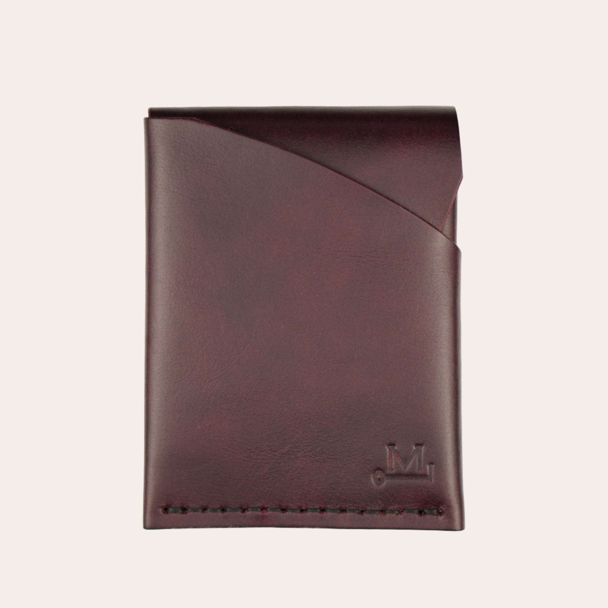 Red leather wallet on a white background