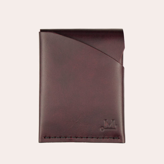 Red leather wallet on a white background