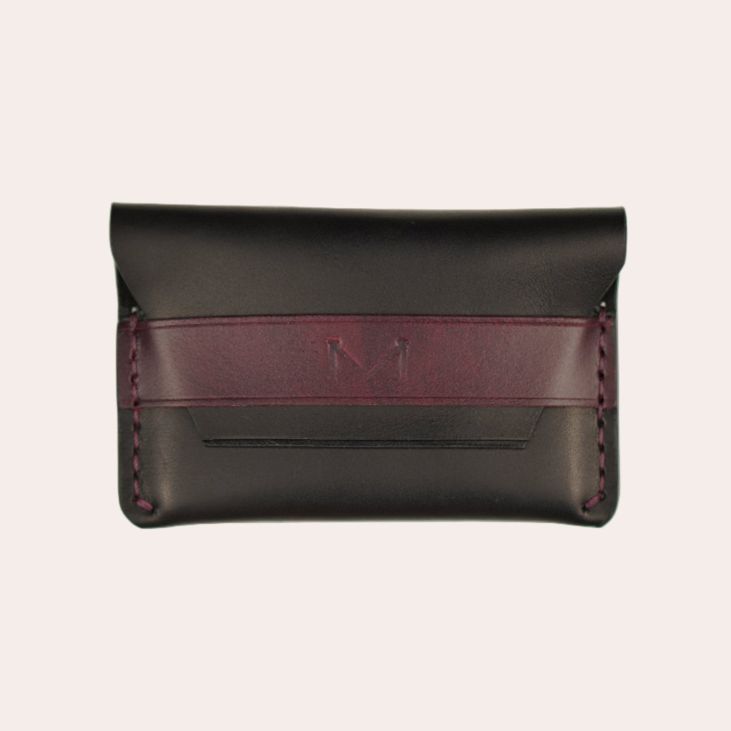Black leather wallet with a burgundy strap on a white background