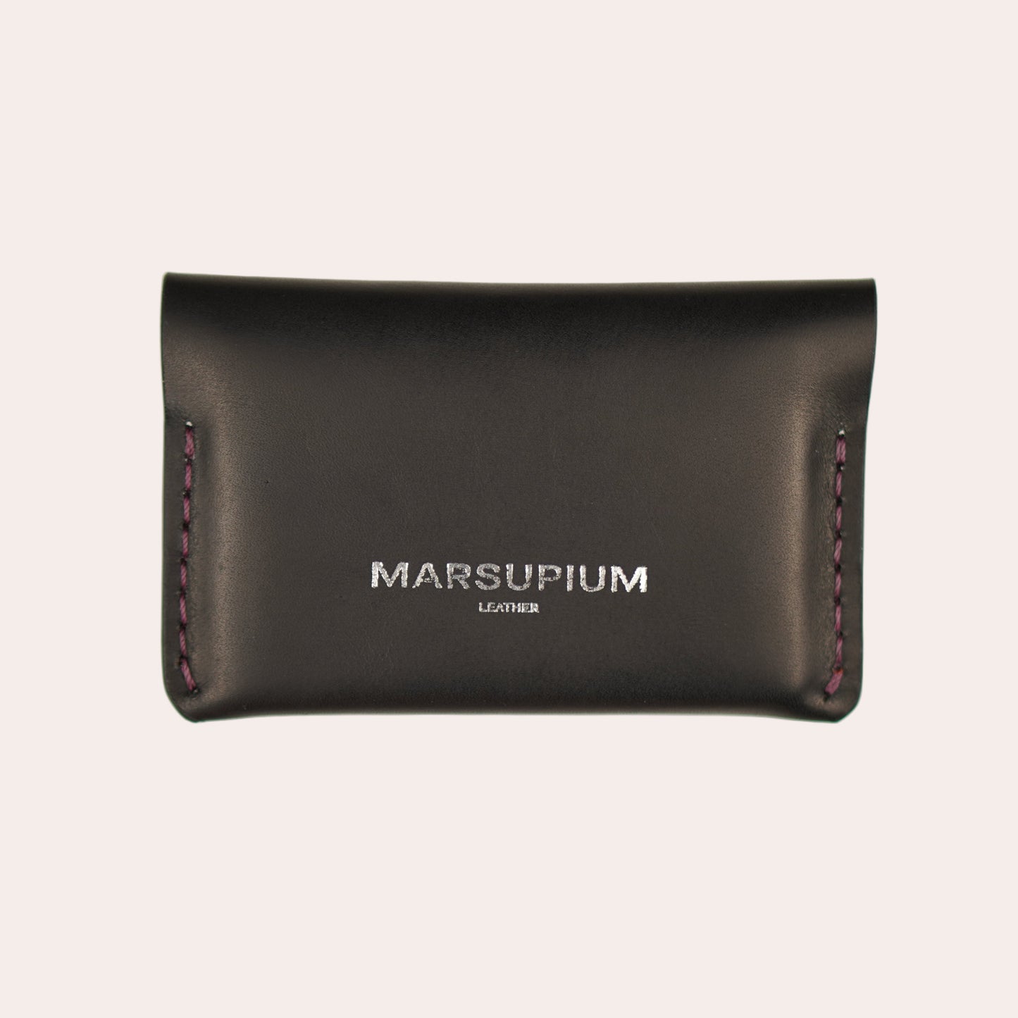 Black leather wallet with 'Marsupium' branding on a white background