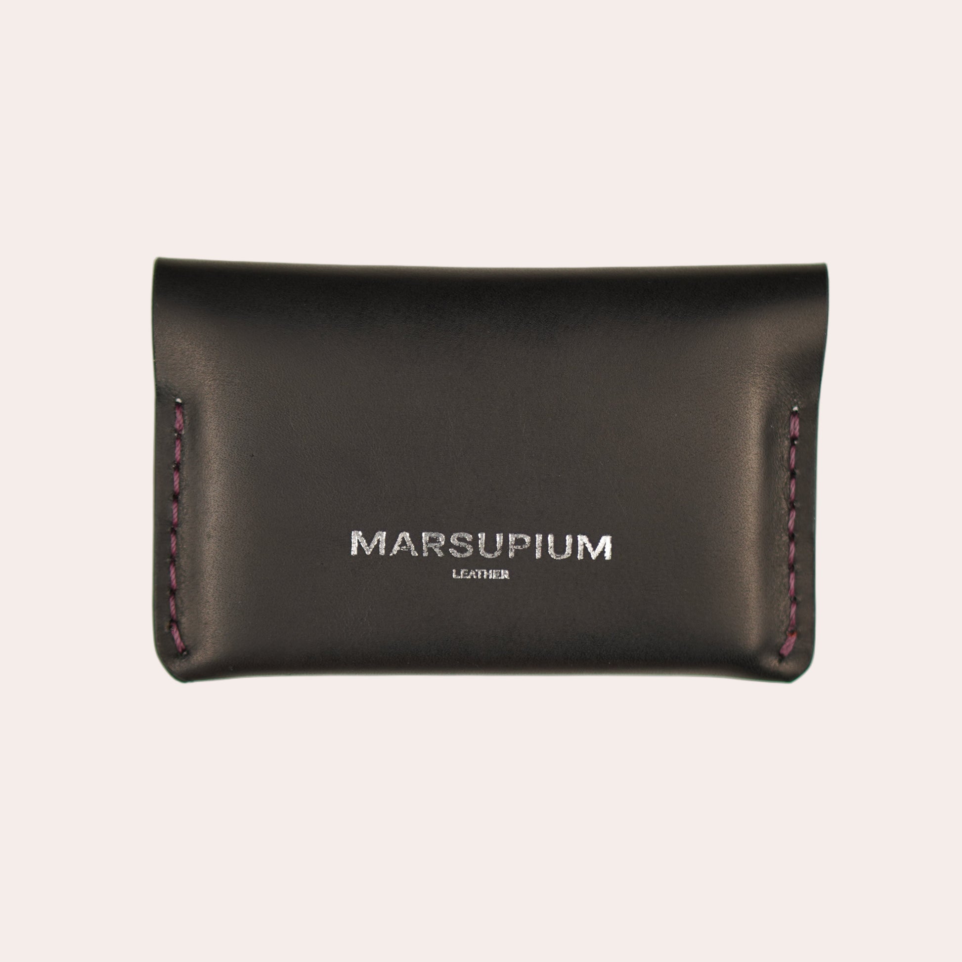 Black leather wallet with 'Marsupium' branding on a white background
