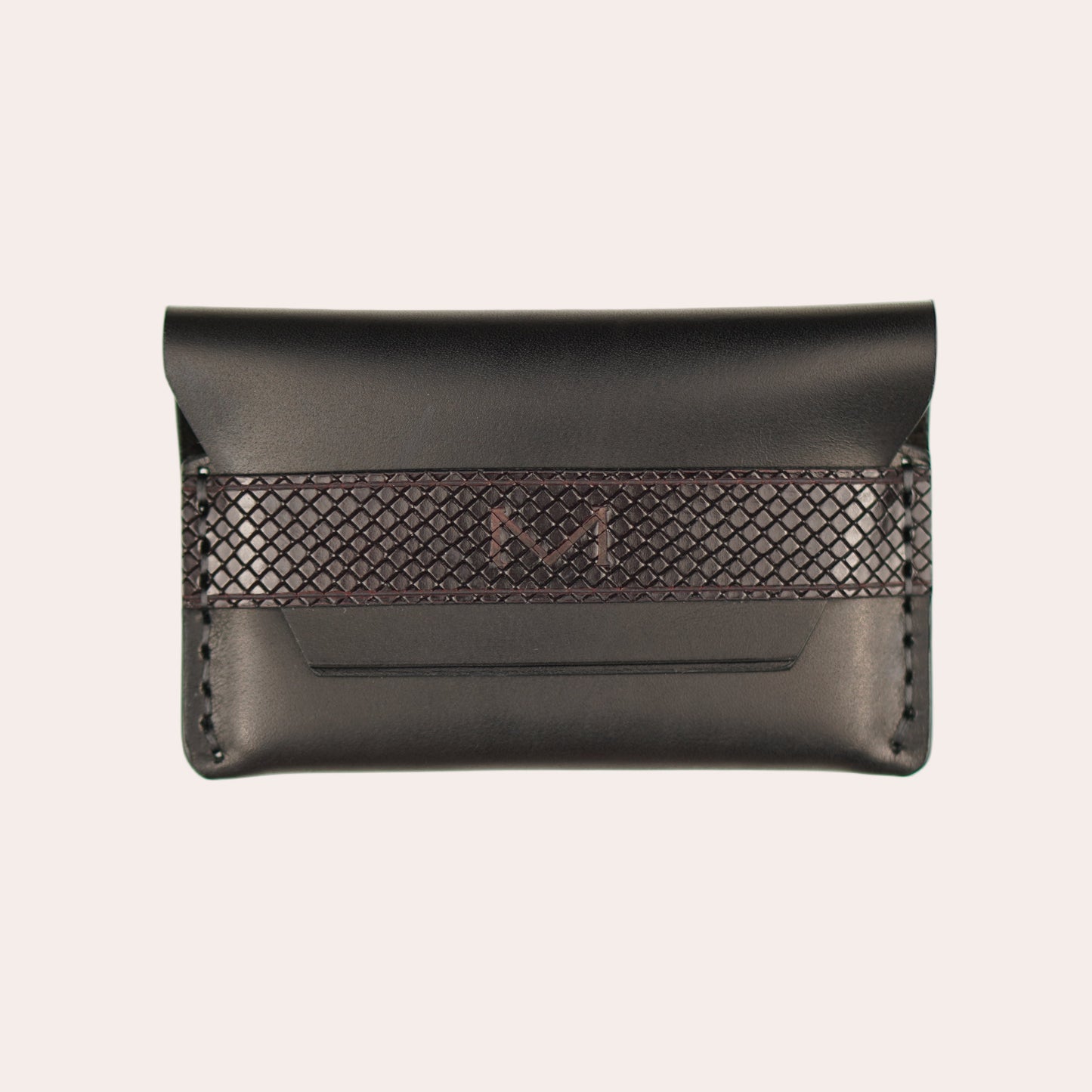Black leather wallet with woven pattern on a white background