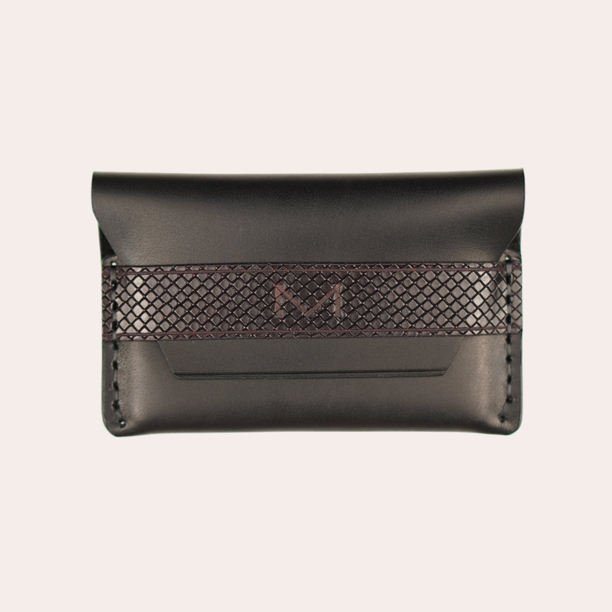 Black leather wallet with woven pattern on a white background