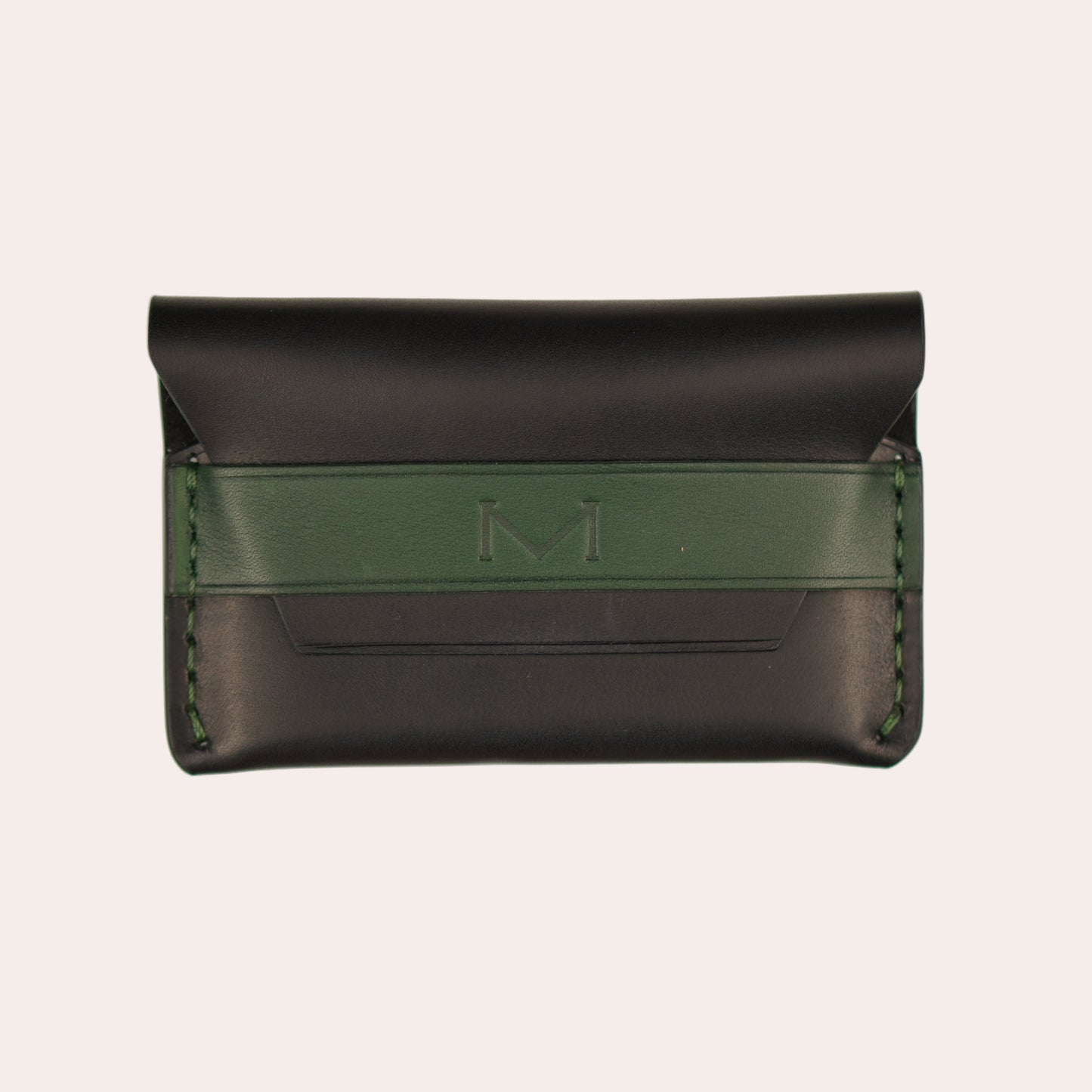 Black wallet with green strap on a white background